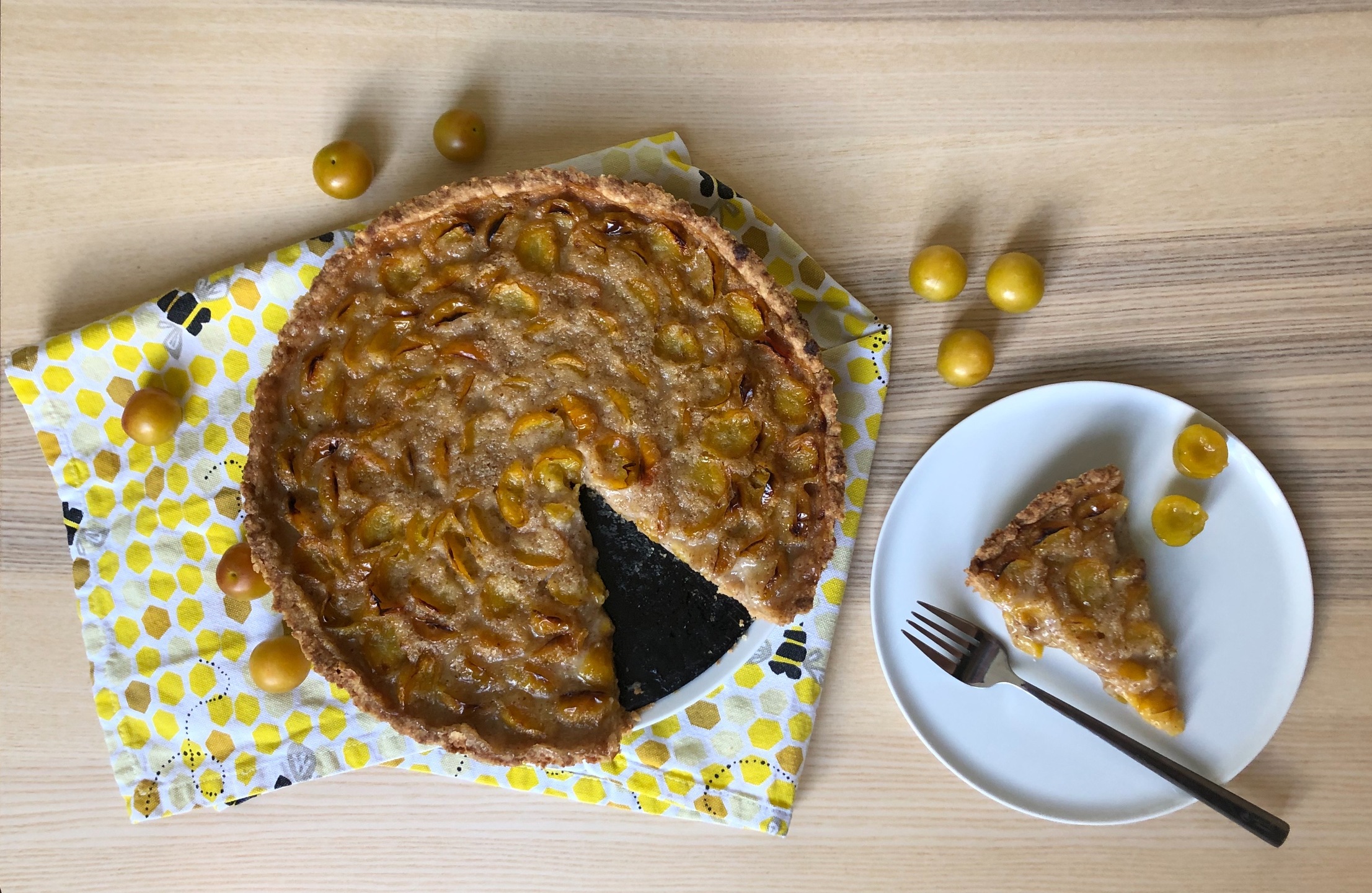 Mirabelles tarte with slice on the side
