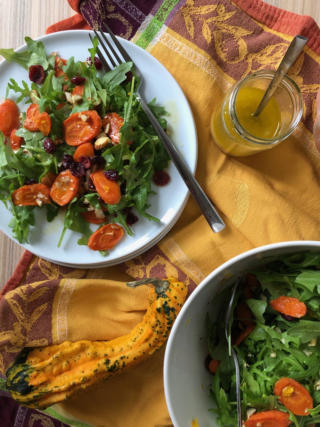 Salad with carrots, cranberries, and orange dressing