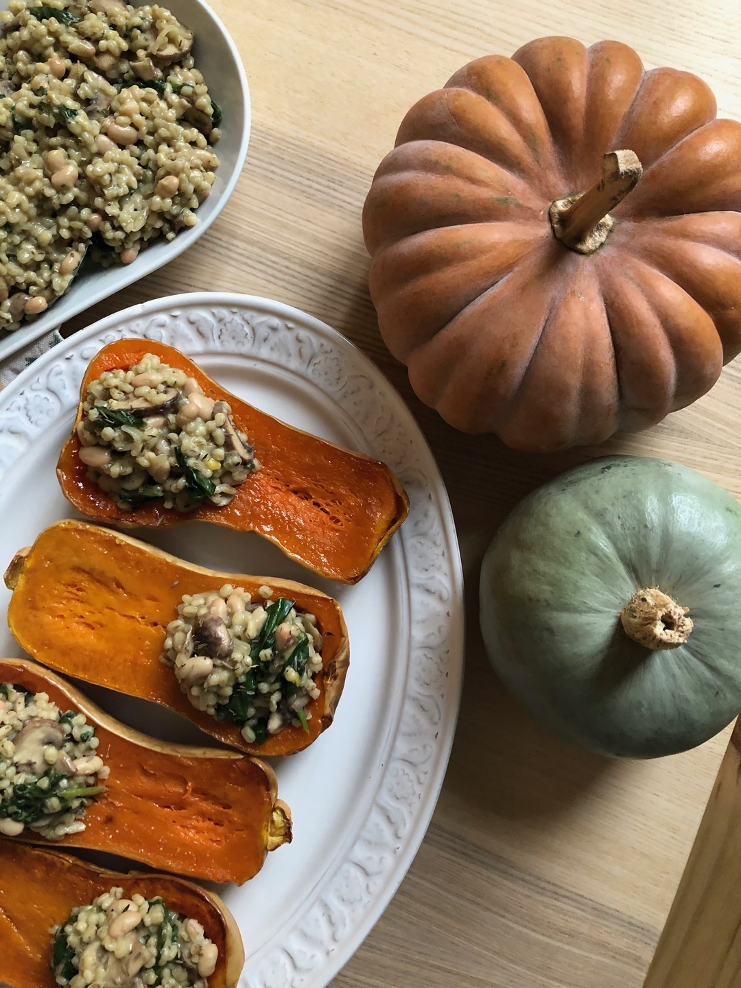 Butternut squash stuffed with barley risotto and mushrooms